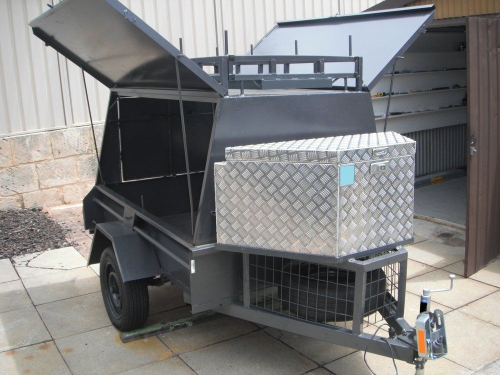A Black Trailer with A Stainless Steel Box on The Side — North Coast Steel in Port Macquarie, NSW