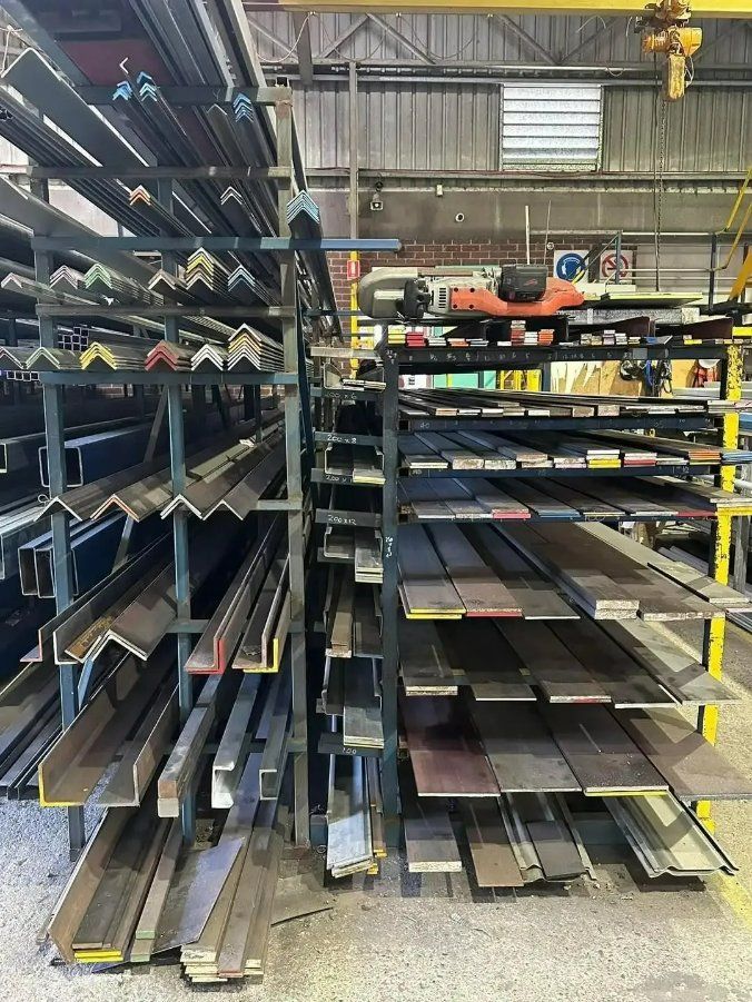 A Warehouse Filled with Lots of Metal Pieces on Shelves — North Coast Steel in South Kempsey, NSW