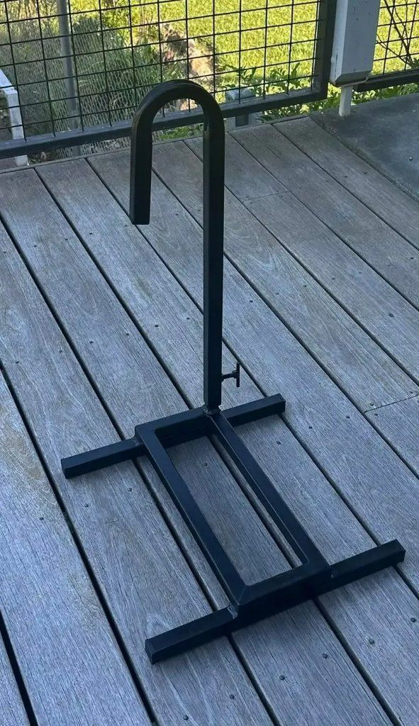 A Black Metal Stand Is Sitting on Top of A Wooden Deck — North Coast Steel in South West Rocks, NSW