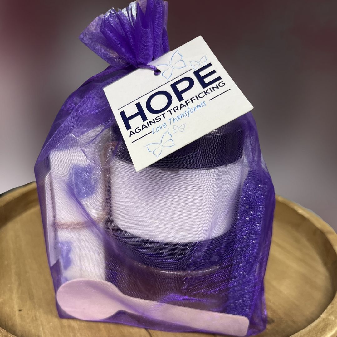 A purple bag with a tag that says hope against trafficking