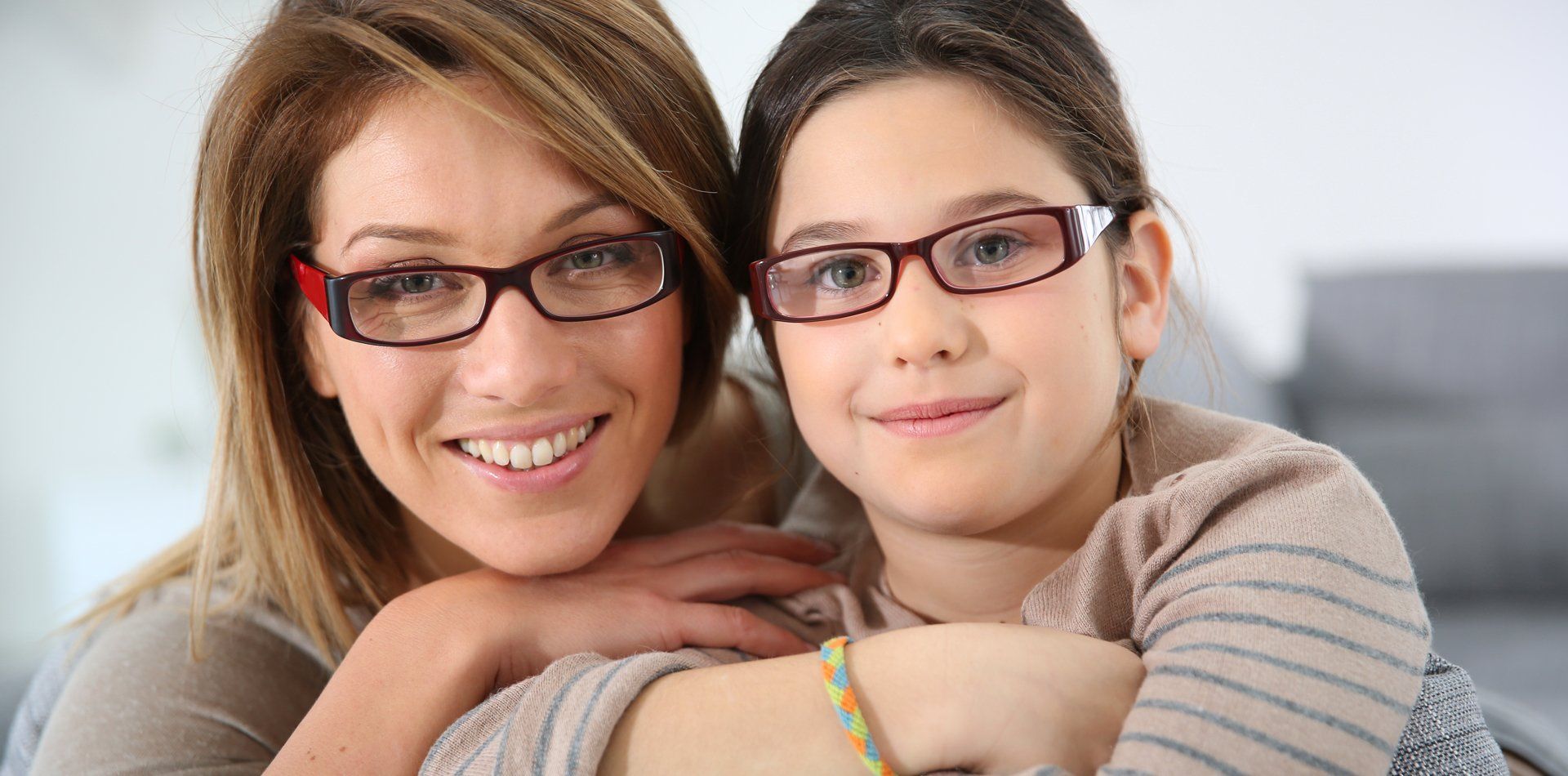 Mother and daughter wearing specs