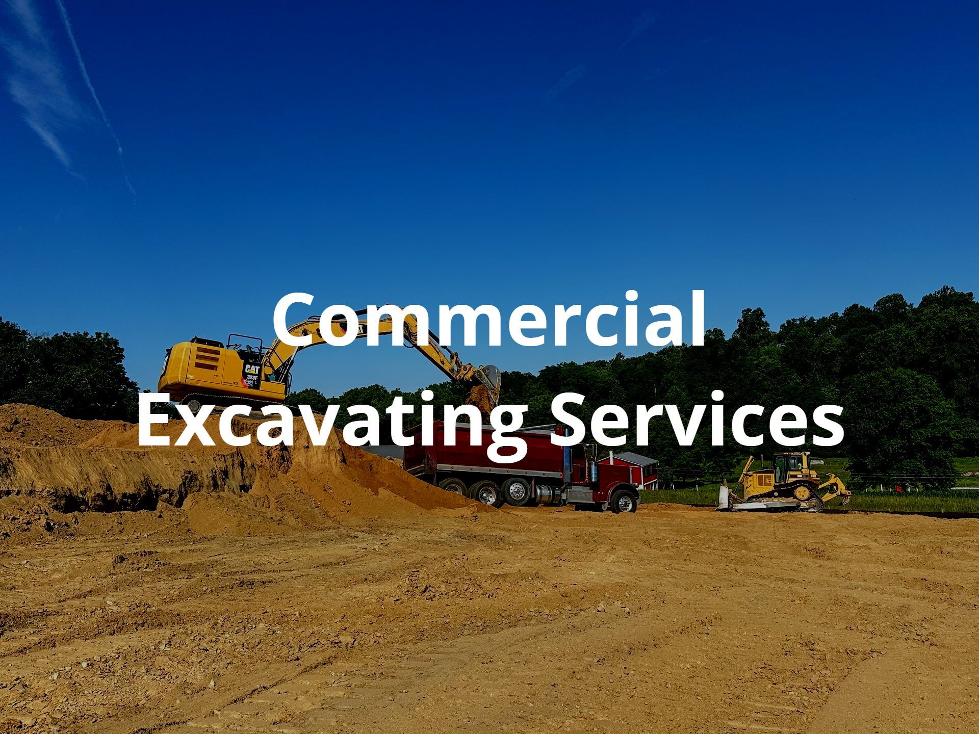 A picture of a construction site with an excavator and dump truck from R. Work Excavating & Trucking and the words commercial excavating services