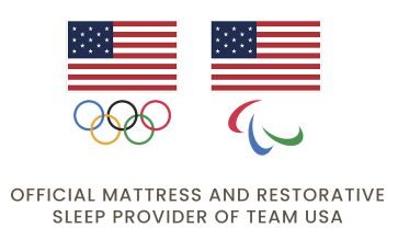 American flag with Olympic and Paralympic symbols, text: Official Mattress Provider of Team USA.