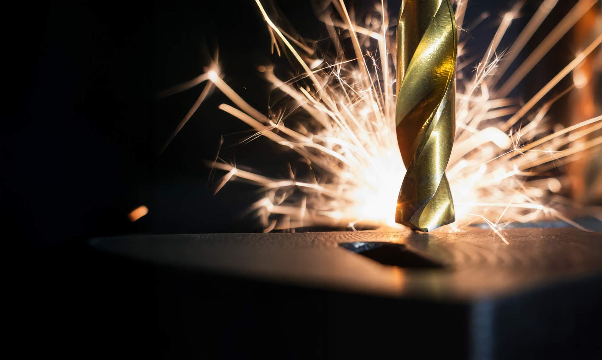Drill bit creating sparks while drilling metal