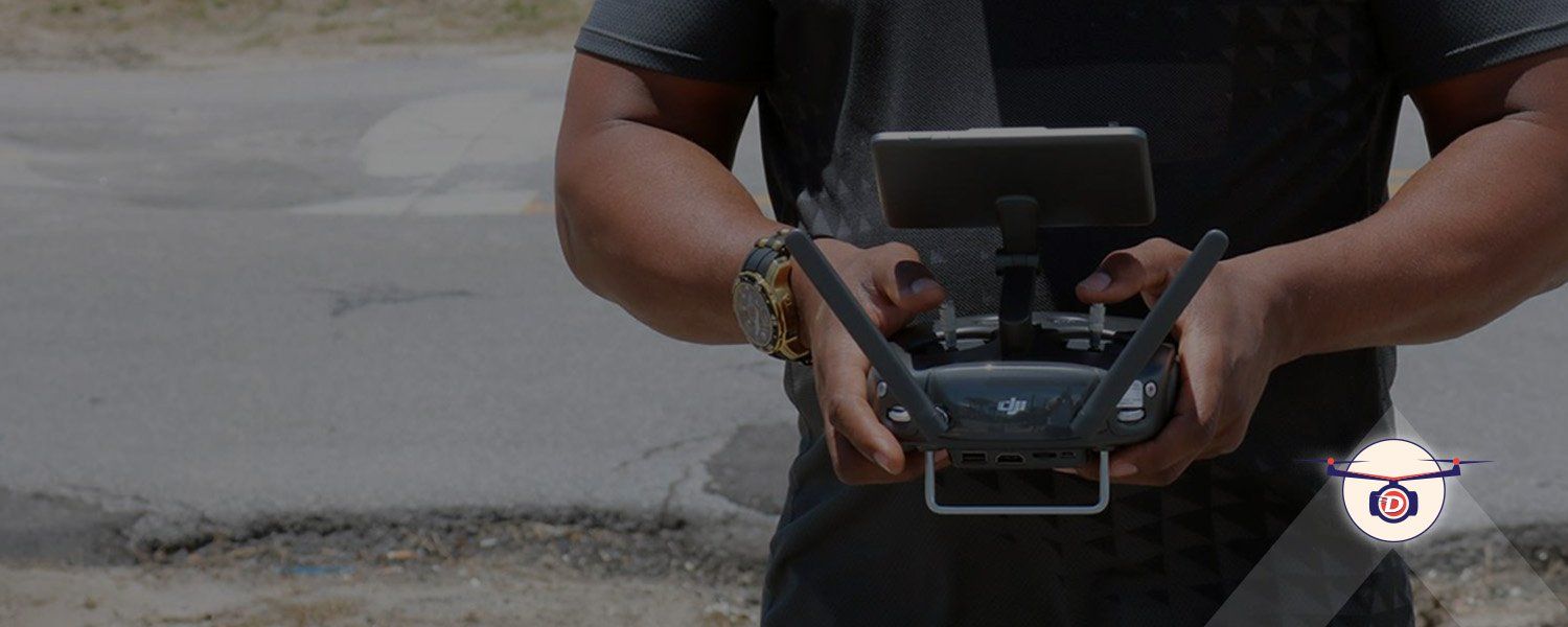 Close View of a Person Holding Drone Controls