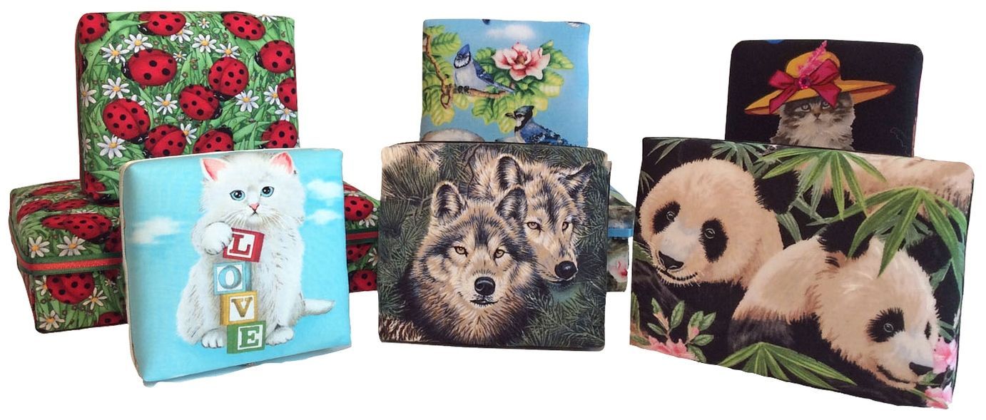 A group of boxes with pictures of animals on them.