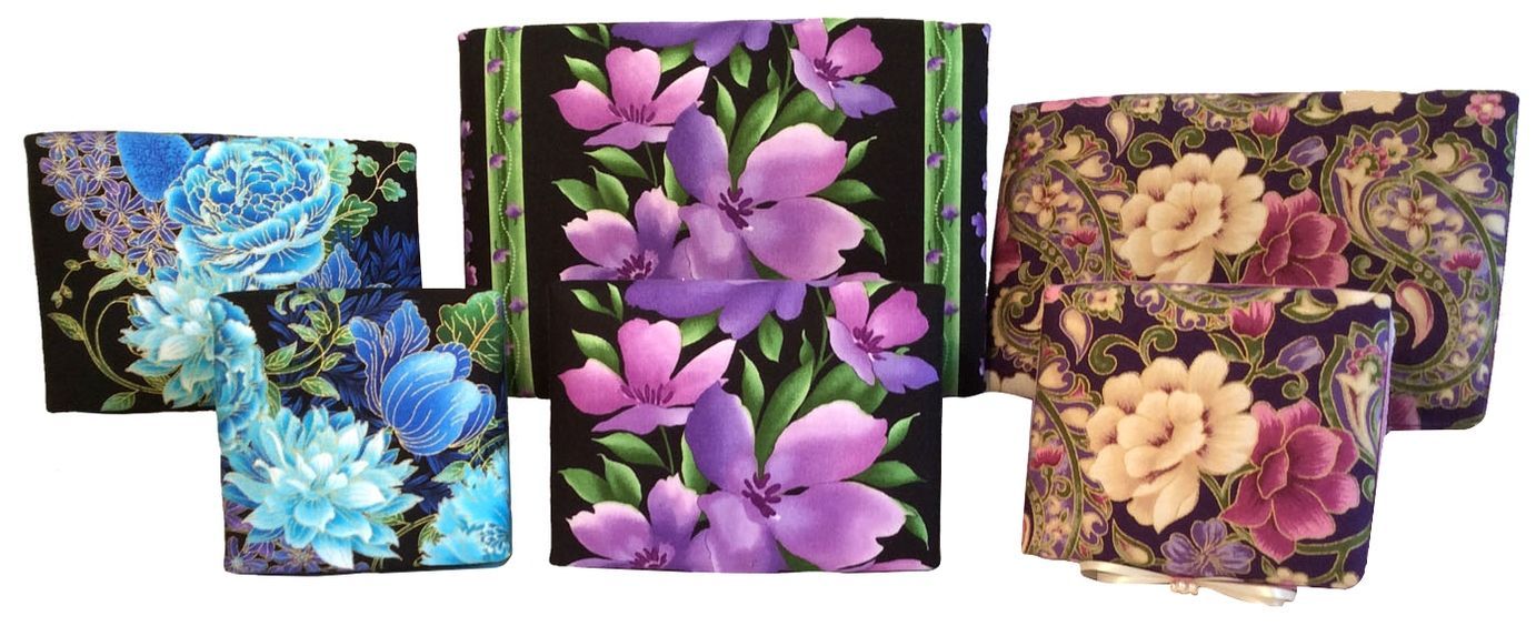 A group of boxes with flowers on them on a white background.