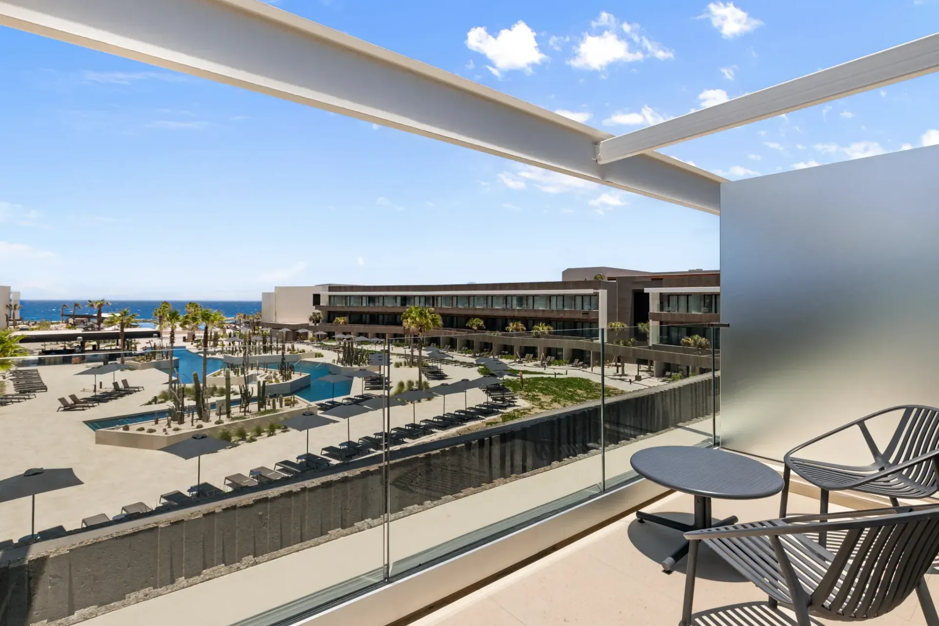 Ocean view balcony overlooking Secrets Baby Beach Resort during Ladies Escape 2027