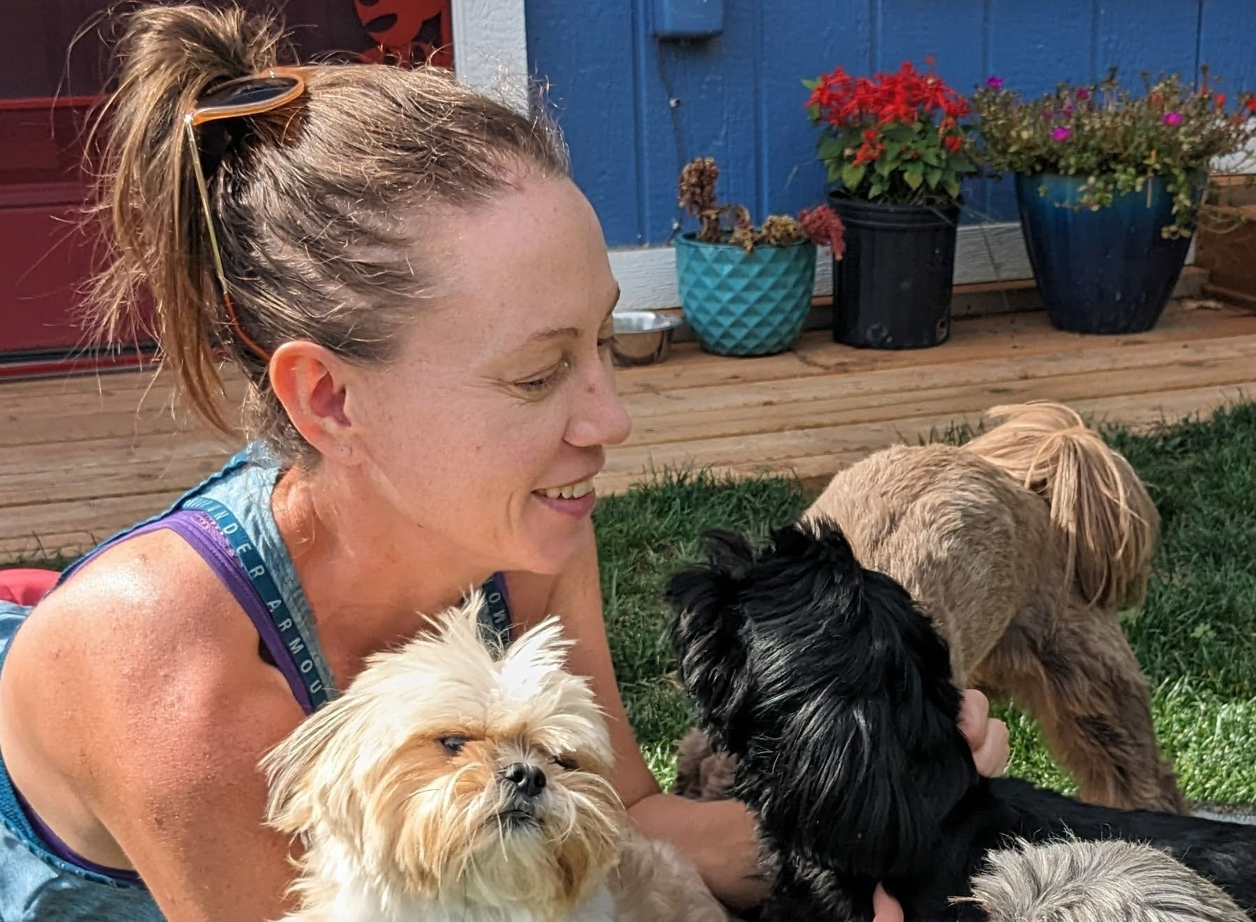 Adelle, owner of Best Pet Care, walking dogs.