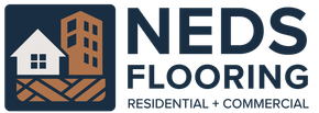 The logo for ned 's flooring shows a city skyline with houses on the roofs.