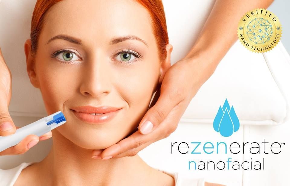 Woman receiving a Rezenarate nano facial treatment; beautician holding her face.