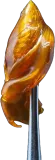 Close-up of golden, translucent cannabis concentrate held by metal tweezers.