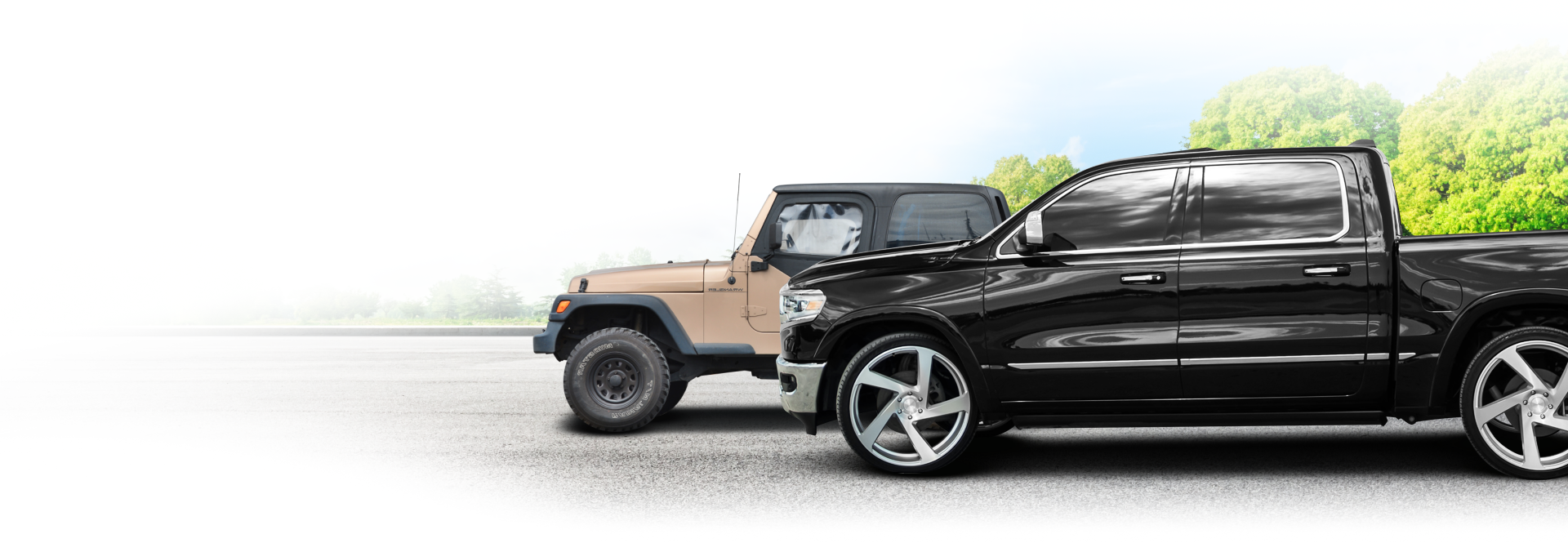 A beige Jeep and black pickup truck are parked on a road. Green foliage and a blue sky are visible in the background | Chip Ragans Auto, LLC