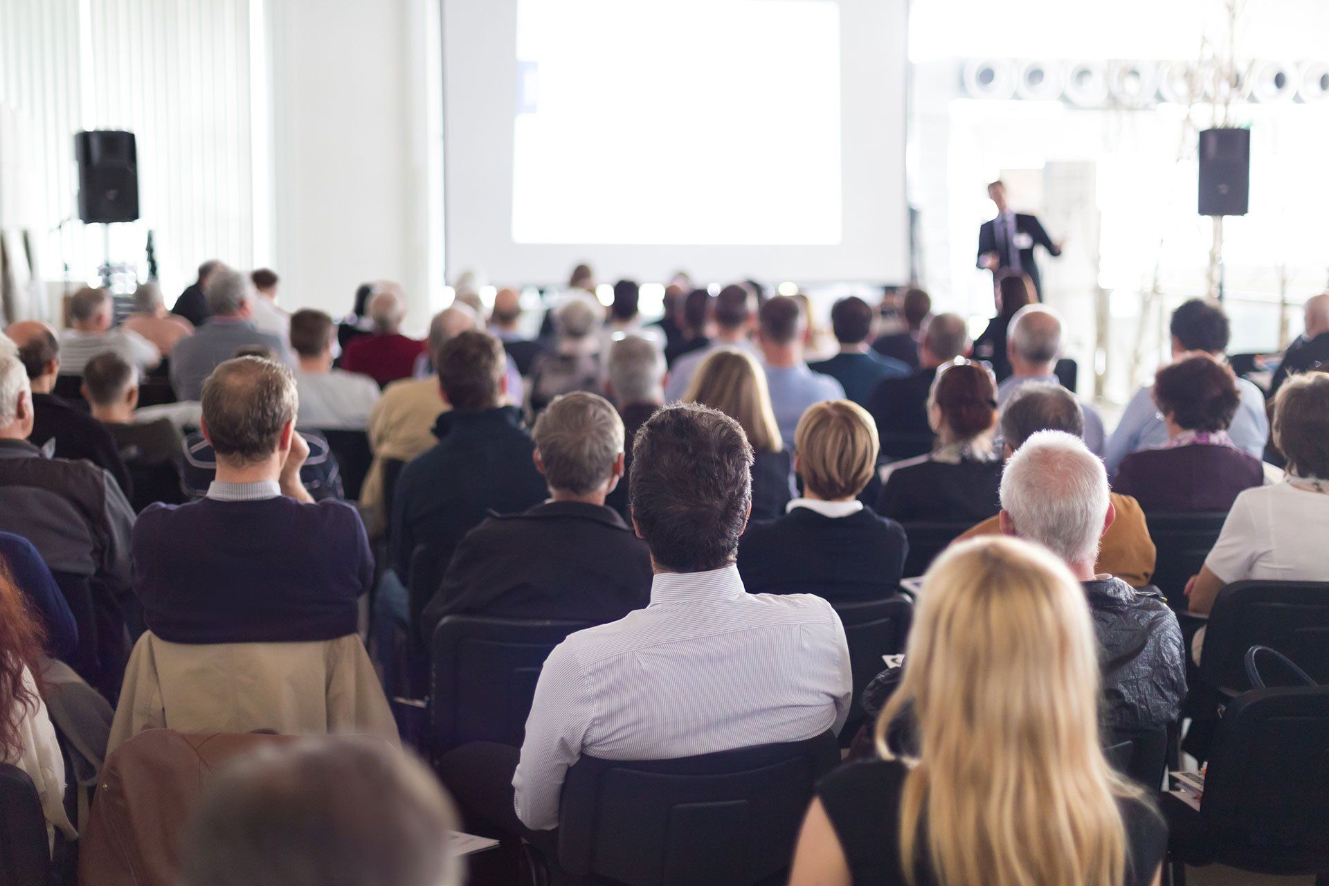 Professional answering question at an event