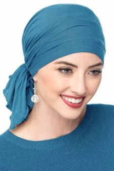 woman wears bamboo chemo cap to hide hair loss