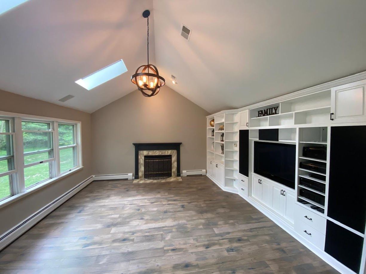 There is a fireplace in the middle of the room.