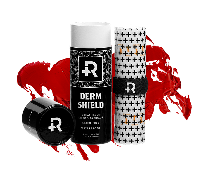 A bottle of derm shield next to a tube of lip balm.