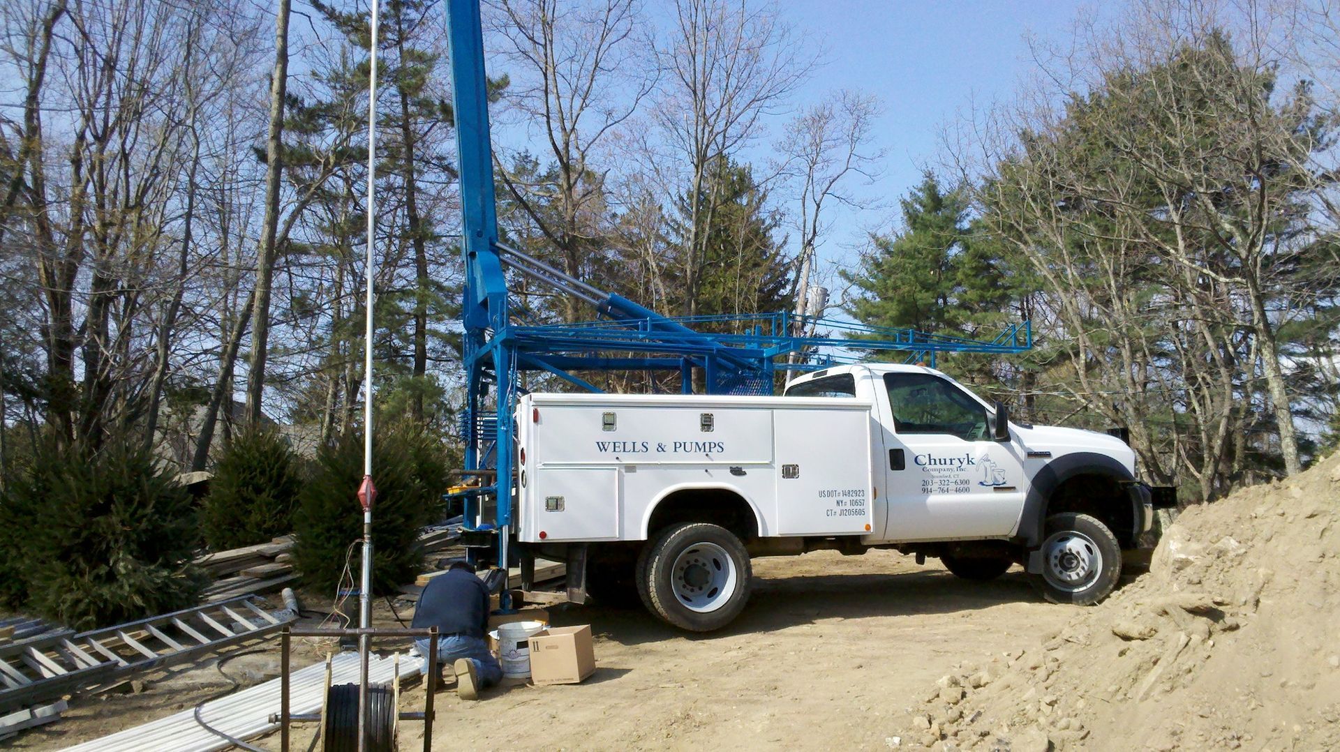 Churyk Company Truck installing new well