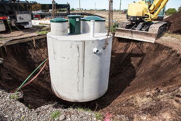 Septic Maintenance — Septic Tank Being Installed in Hendersonville, NC