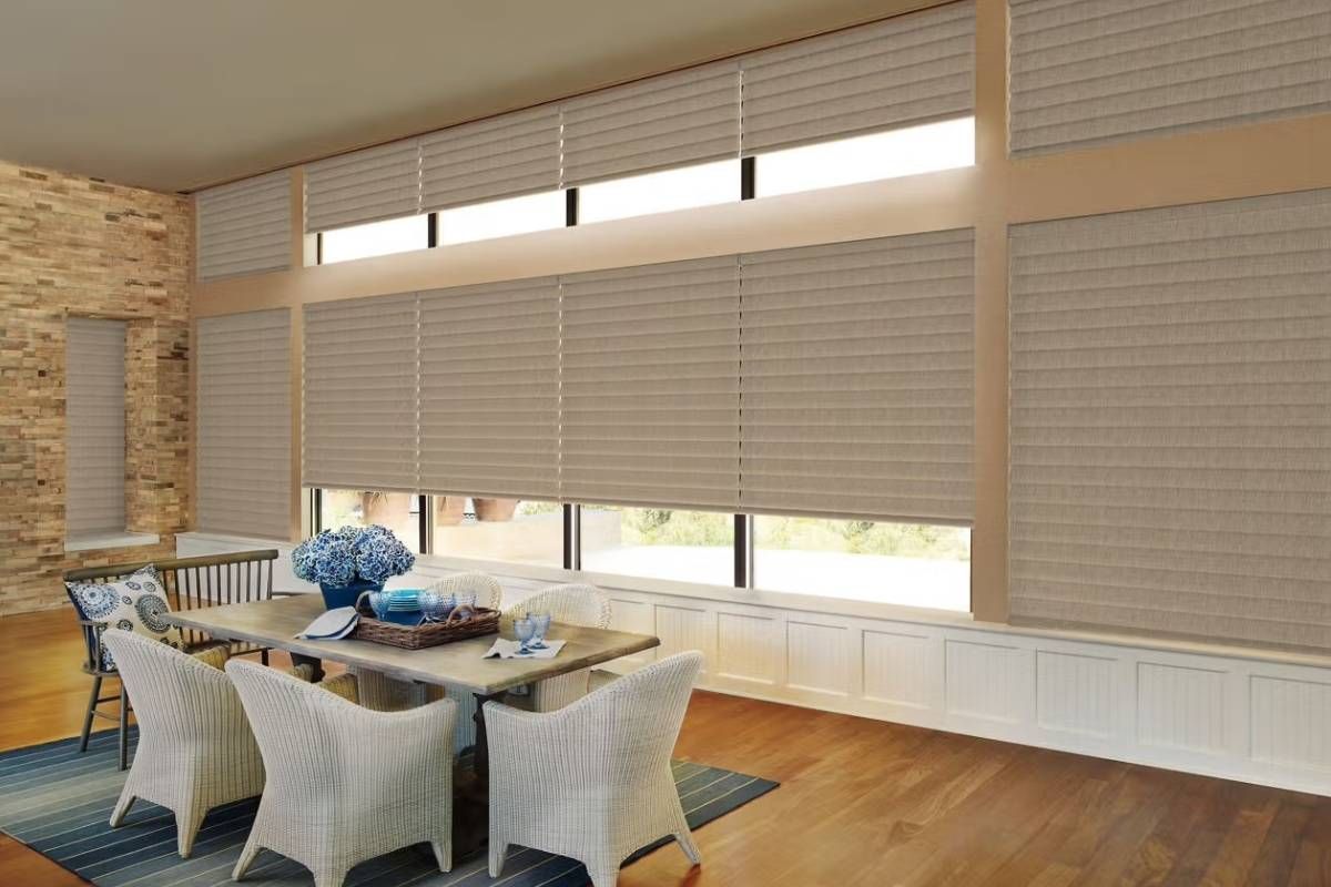 Hunter Douglas Vignette® Roman Shades on a Window Wall in a Dining Room at Style Savvy Designs near Warrenton, VA