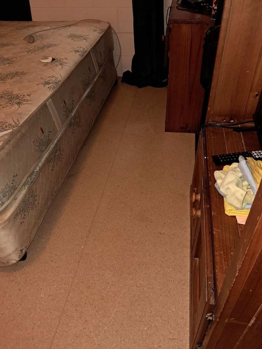 Bedroom With a Bed, Wooden Chest, Brown Carpet — DAH Cleaning Services In Bungalow, QLD