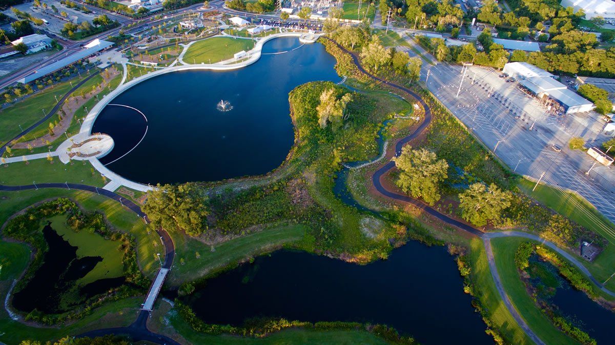 Aerial view of Depot Park and its pond in downtown Gainesville