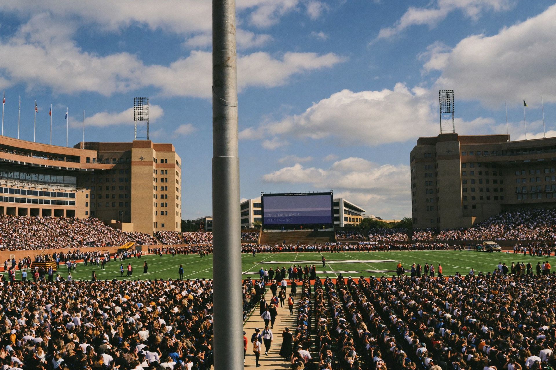 A University of Florida commencement ceremony day inside a packed stadium