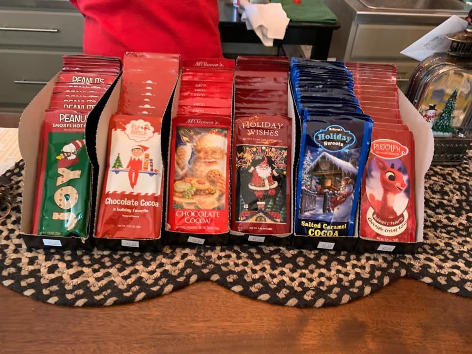 A display of christmas candy including hot chocolate