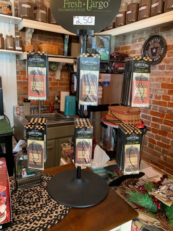 A coffee shop with a sign that says `` fresh cargo '' on it.