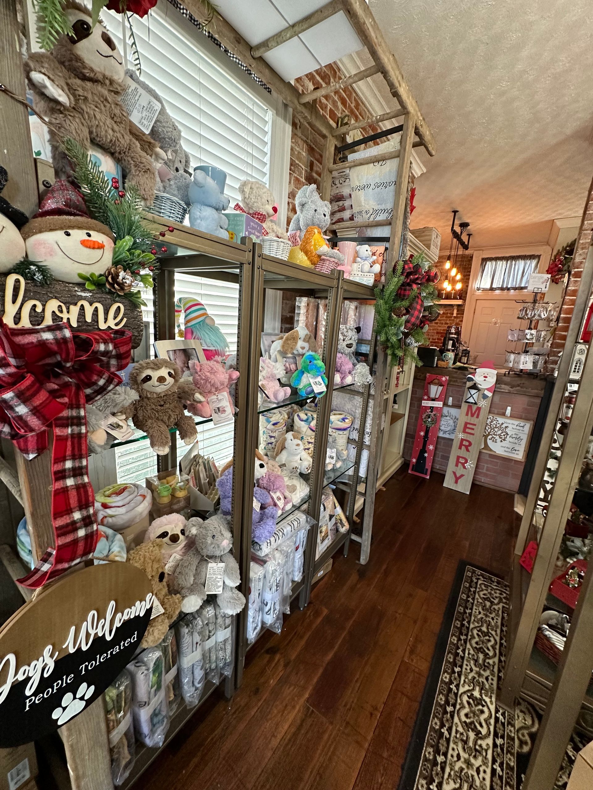A room filled with lots of stuffed animals and christmas decorations.