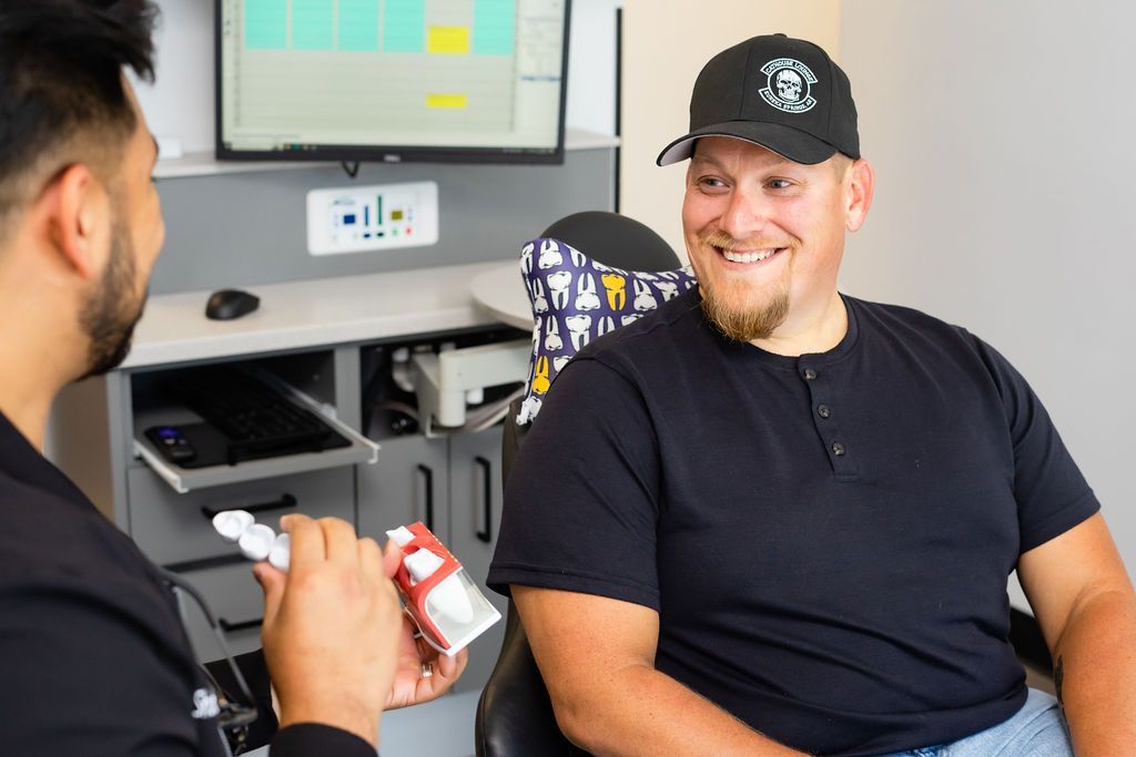 Doctor Shambille talking to a patient.