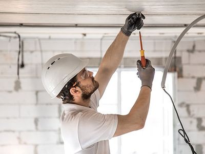 Electrician Working with Cable — Northeastern, PA — Hanson Electric