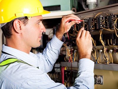 Electrician Working on a Circuit Board — Northeastern, PA — Hanson Electric