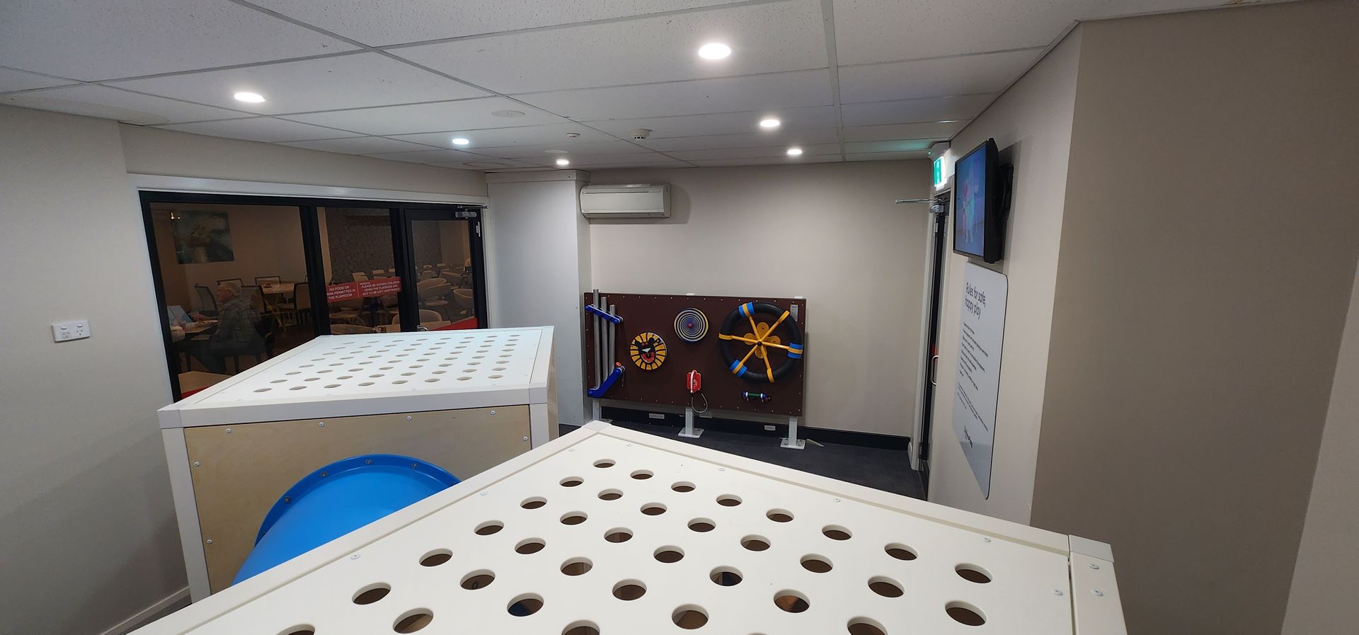 A room with children's play equipment