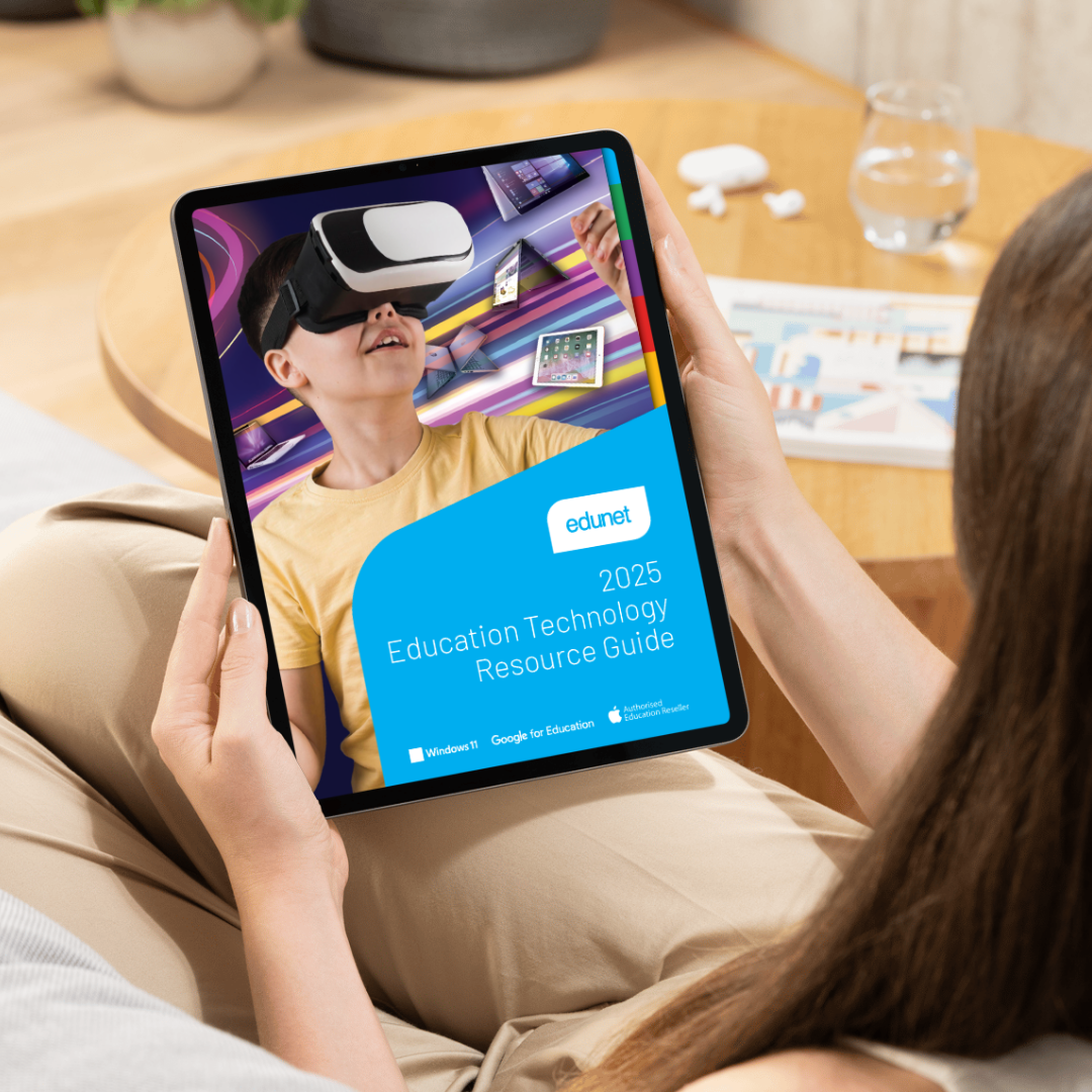 a person is holding a tablet that says skype on it