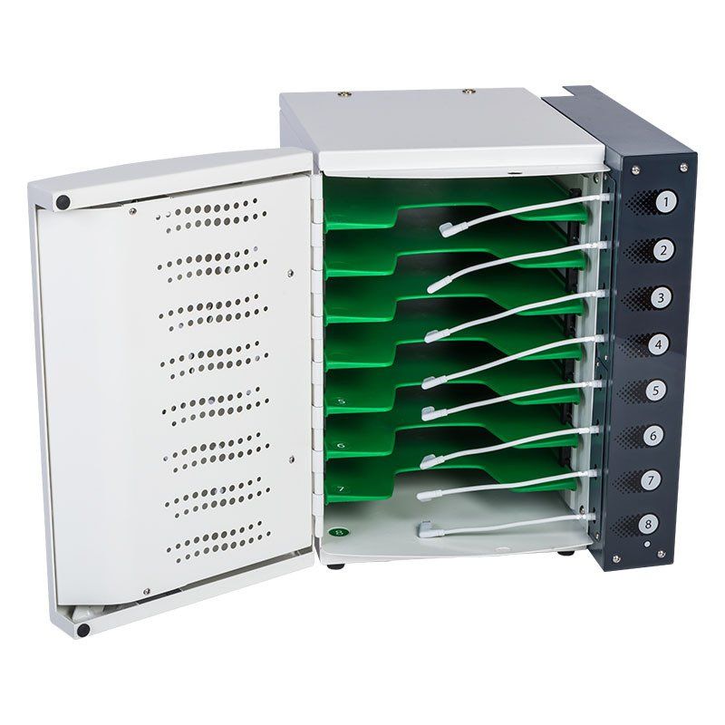 a cabinet with the door open and a bunch of green trays