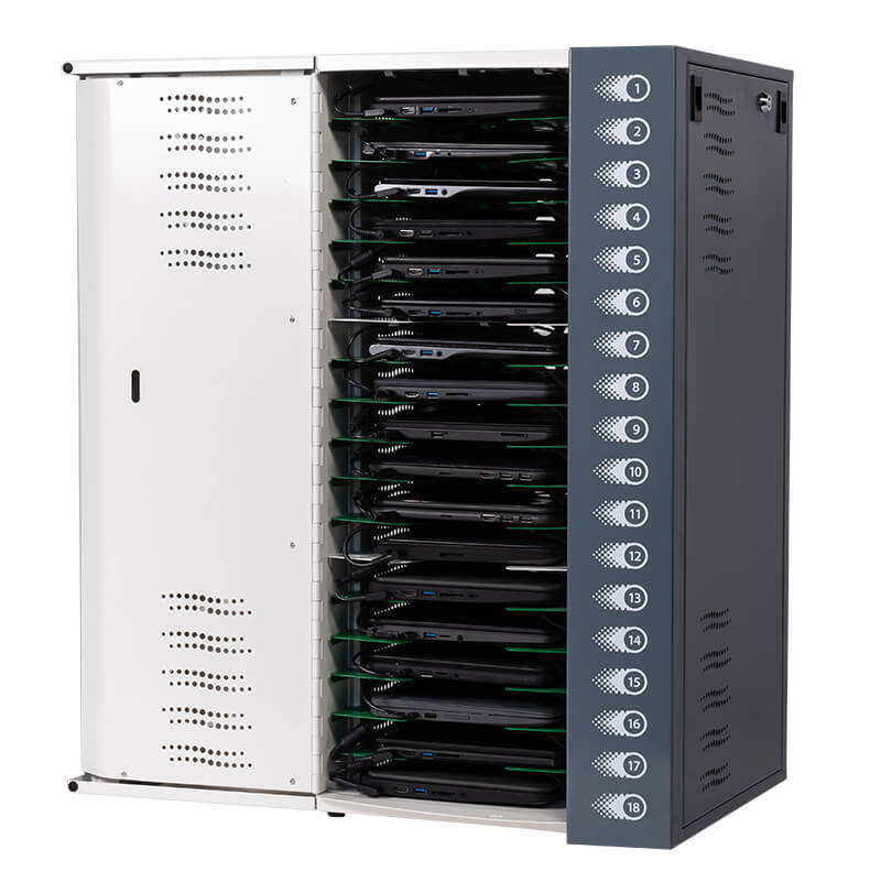 a row of laptops are sitting on top of each other in a rack .