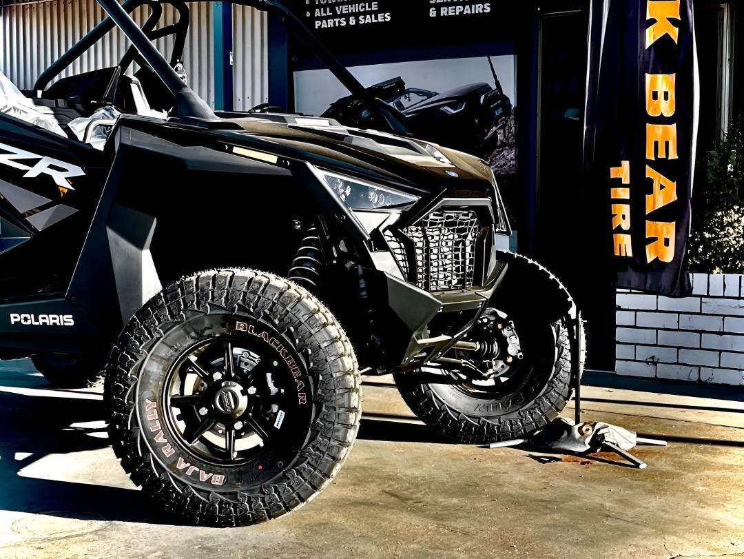 A Polaris ATV Is Parked In Front Of A Store — Territory Wrecking Repairs In Alice Springs, NT