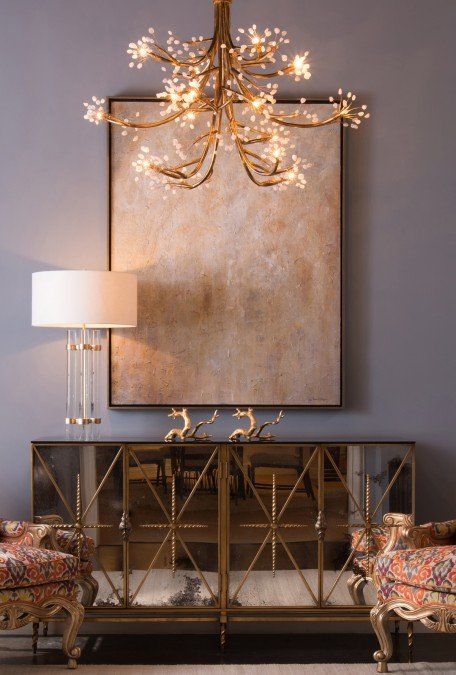 Innovative Home Lighting Fixture Above Classic Artwork