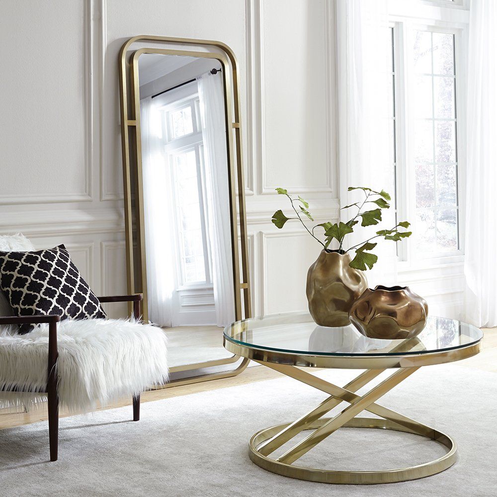 Coffee table with uniquely shaped home décor on top