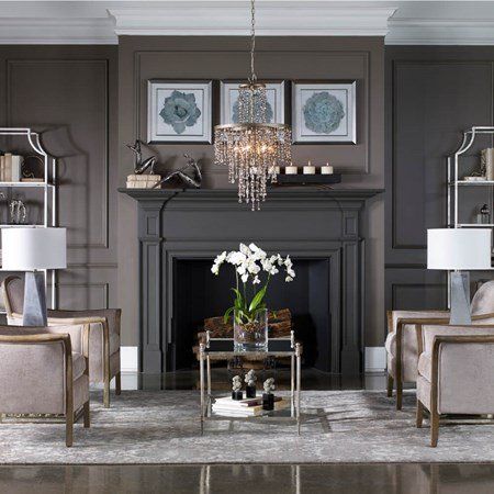 Dangling Chandelier Over Coffee Table in Sitting Area