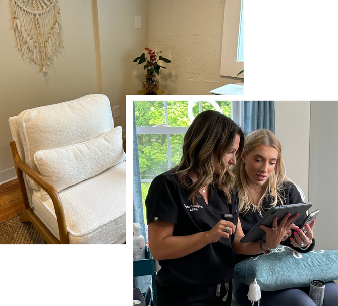 Two women are sitting in a chair looking at a tablet.