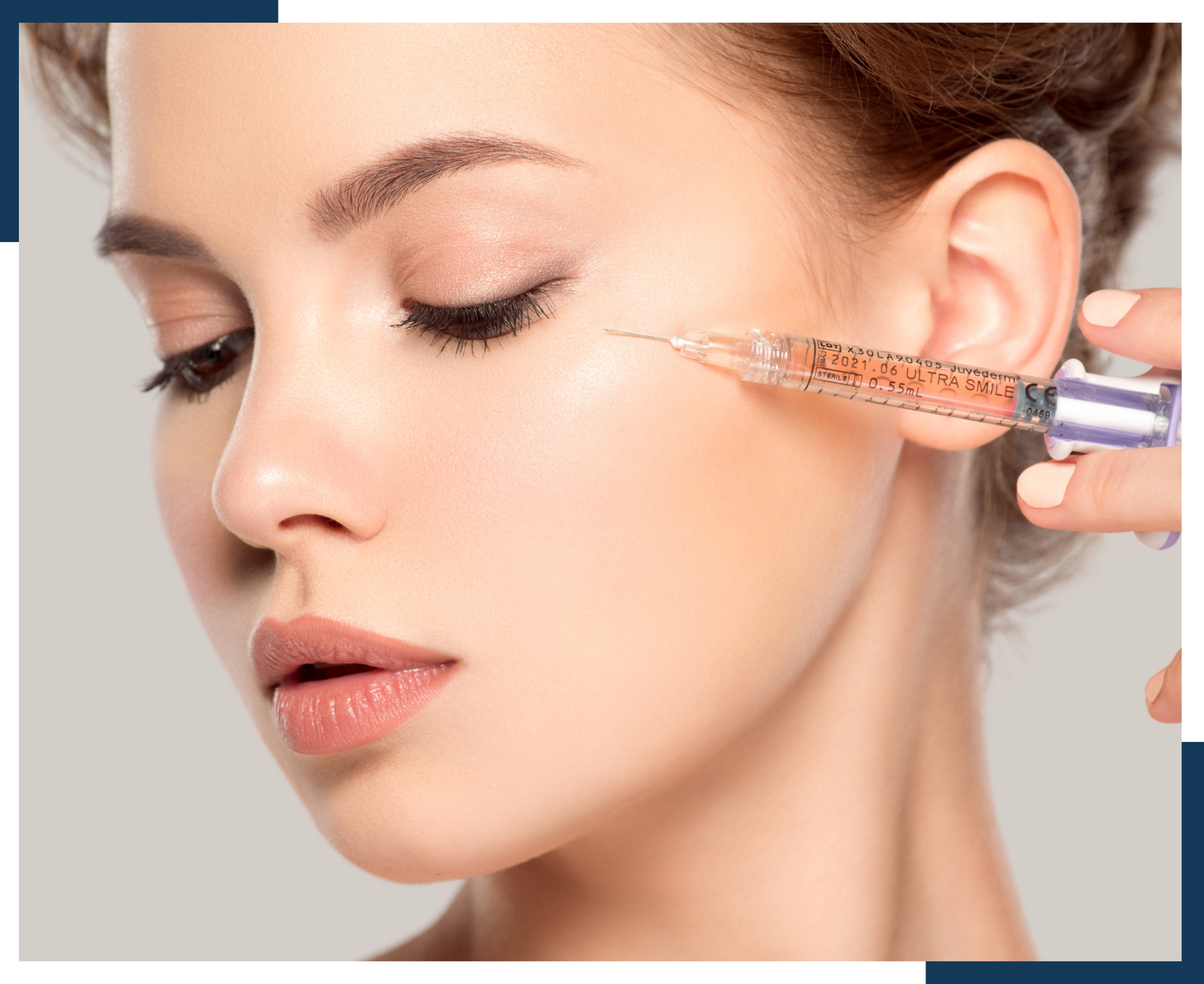 A woman is getting a botox injection in her eye.
