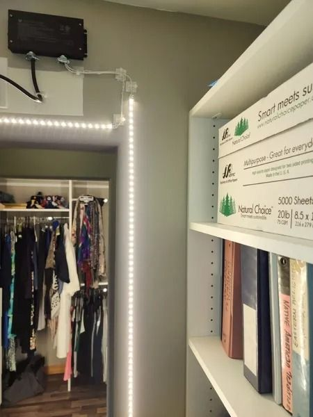A closet with boxes of smart sheets on the shelves