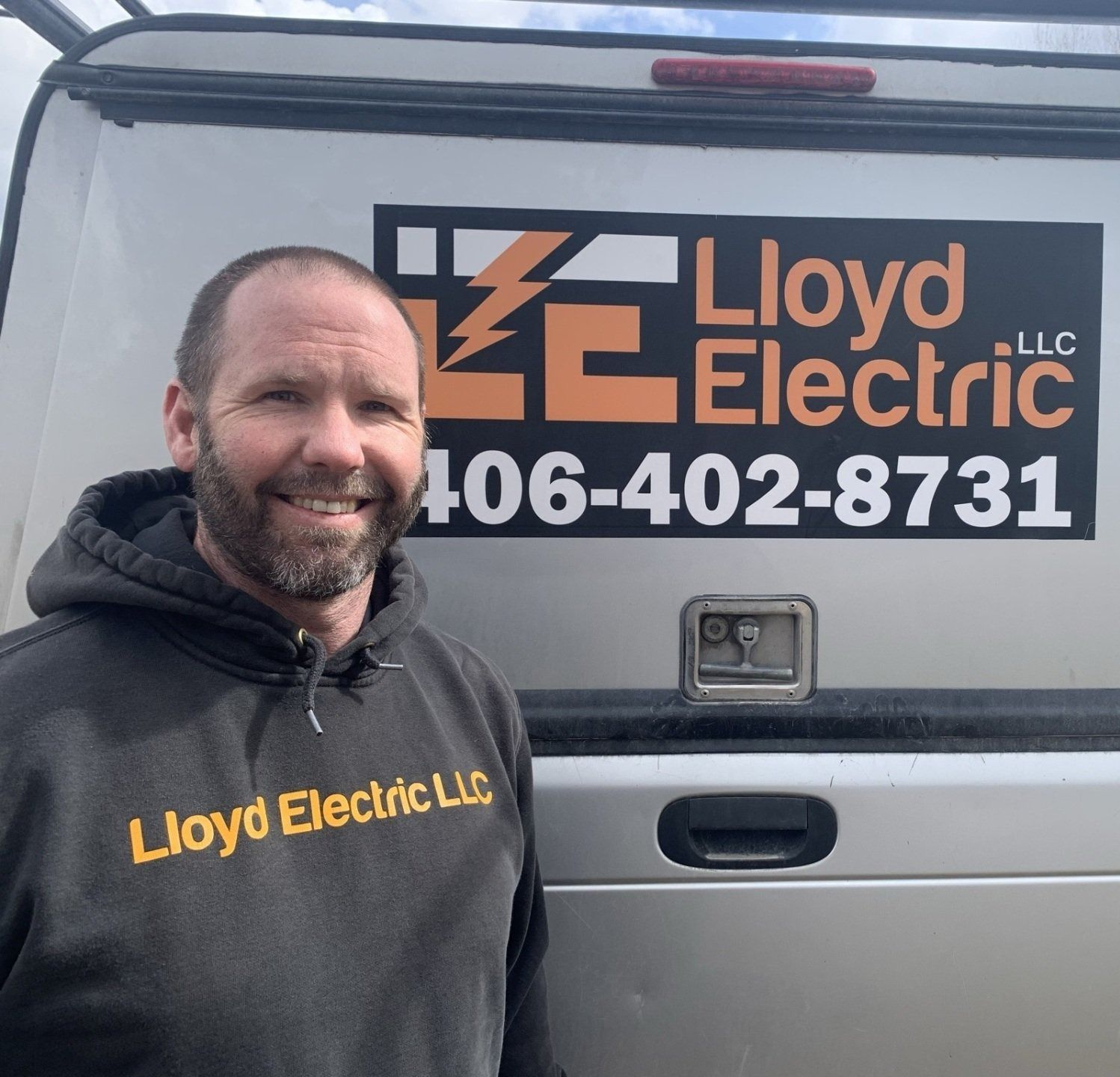 A staircase with two lights on the wall above it