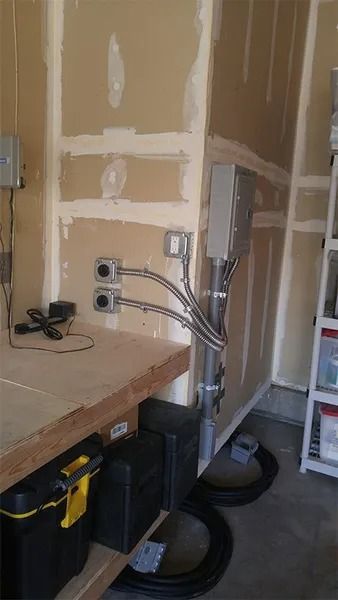 A room with a wooden table and a ladder in it.