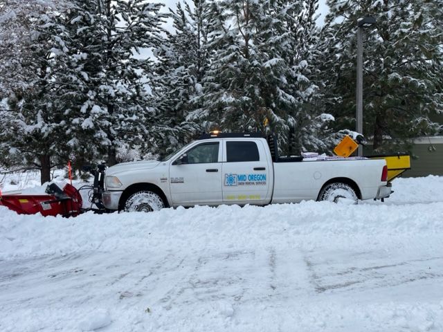 removing thick snow on road