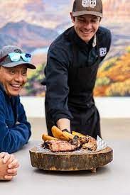 John from Wil's Grill serving BBQ