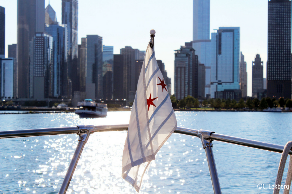 Chicago flag on the bow of a boat on the Chicago River