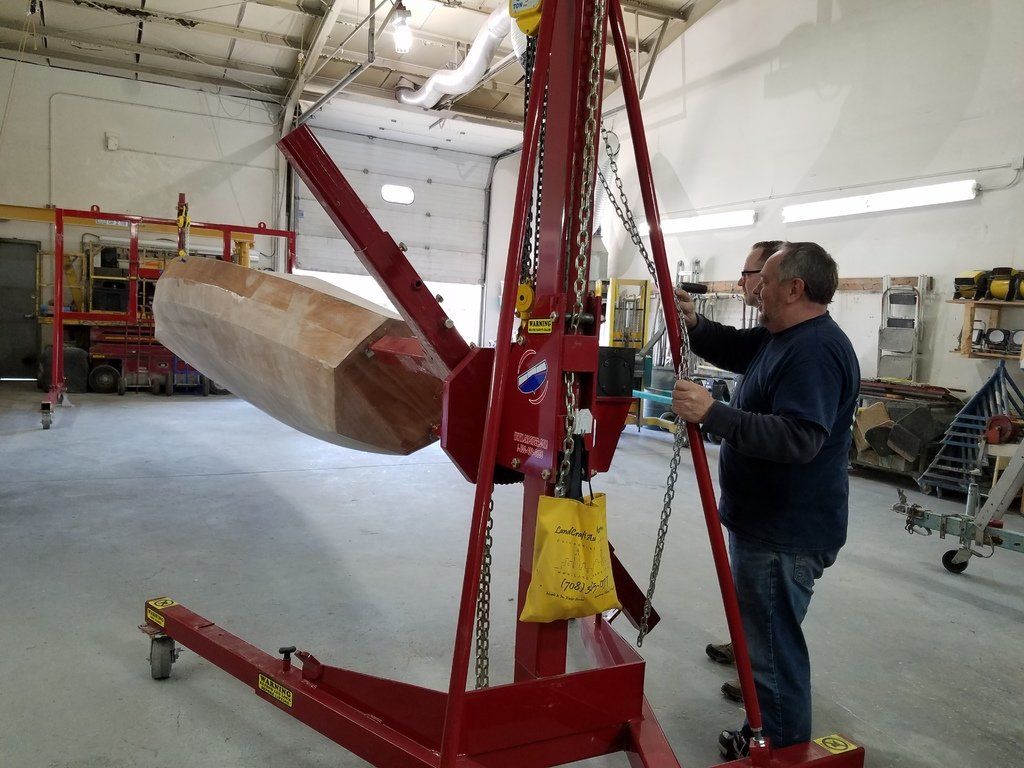 Keith has the Row4Kids boat on the boat rotating equipment for continued work